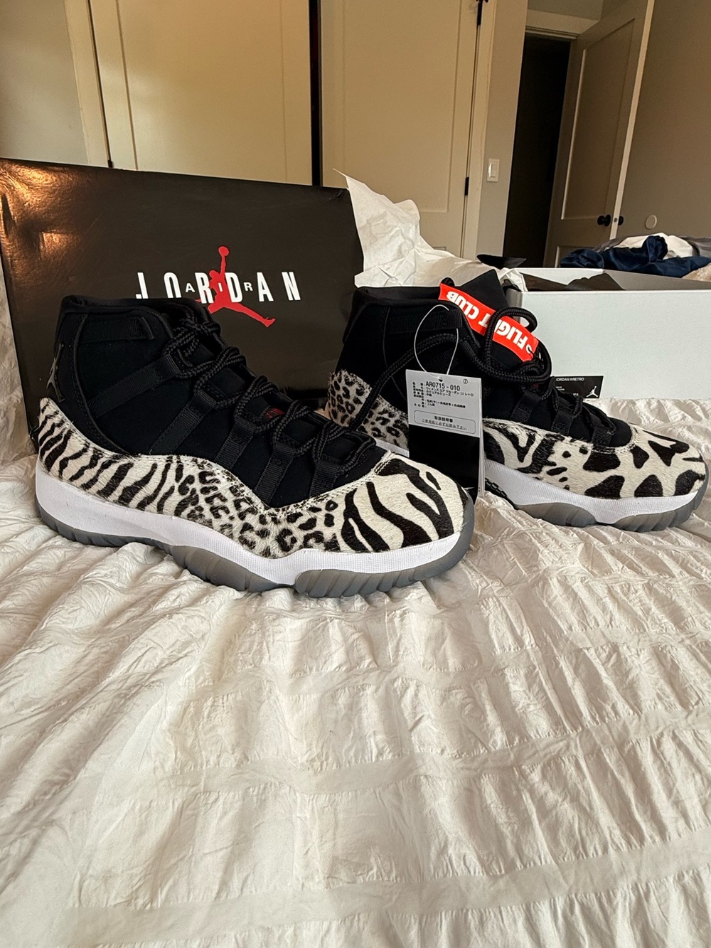 Jordan Women’s Air Jordan Black and White Animal-Print High-Top Sneakers, 10.5